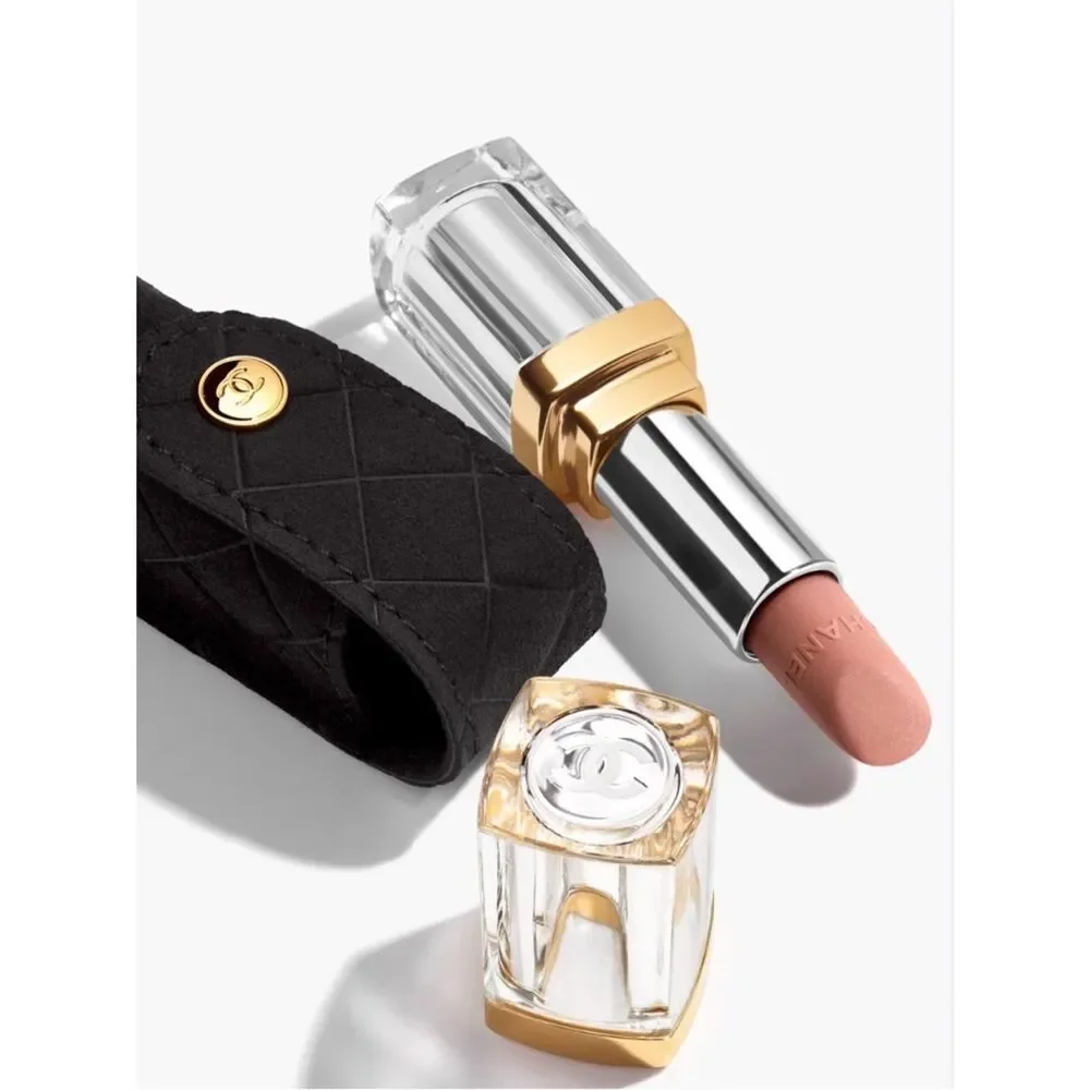 Chanel 31 Le Rouge lipstick case, a black quilted velvet pouch.